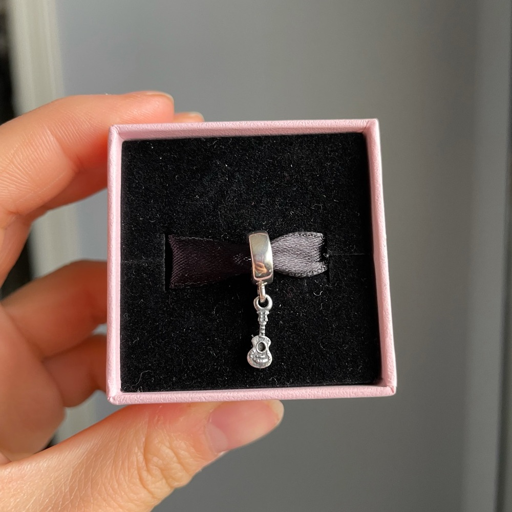 Rare authentic pandora guitar or ukulele dangle.